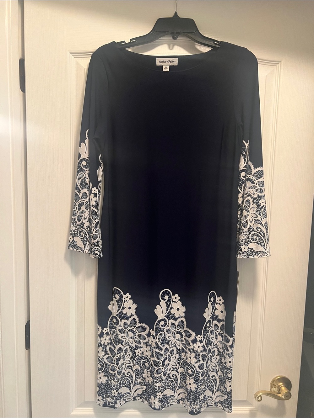 Shelby & Palmer Navy Dress with White Floral Border - Long Sleeve